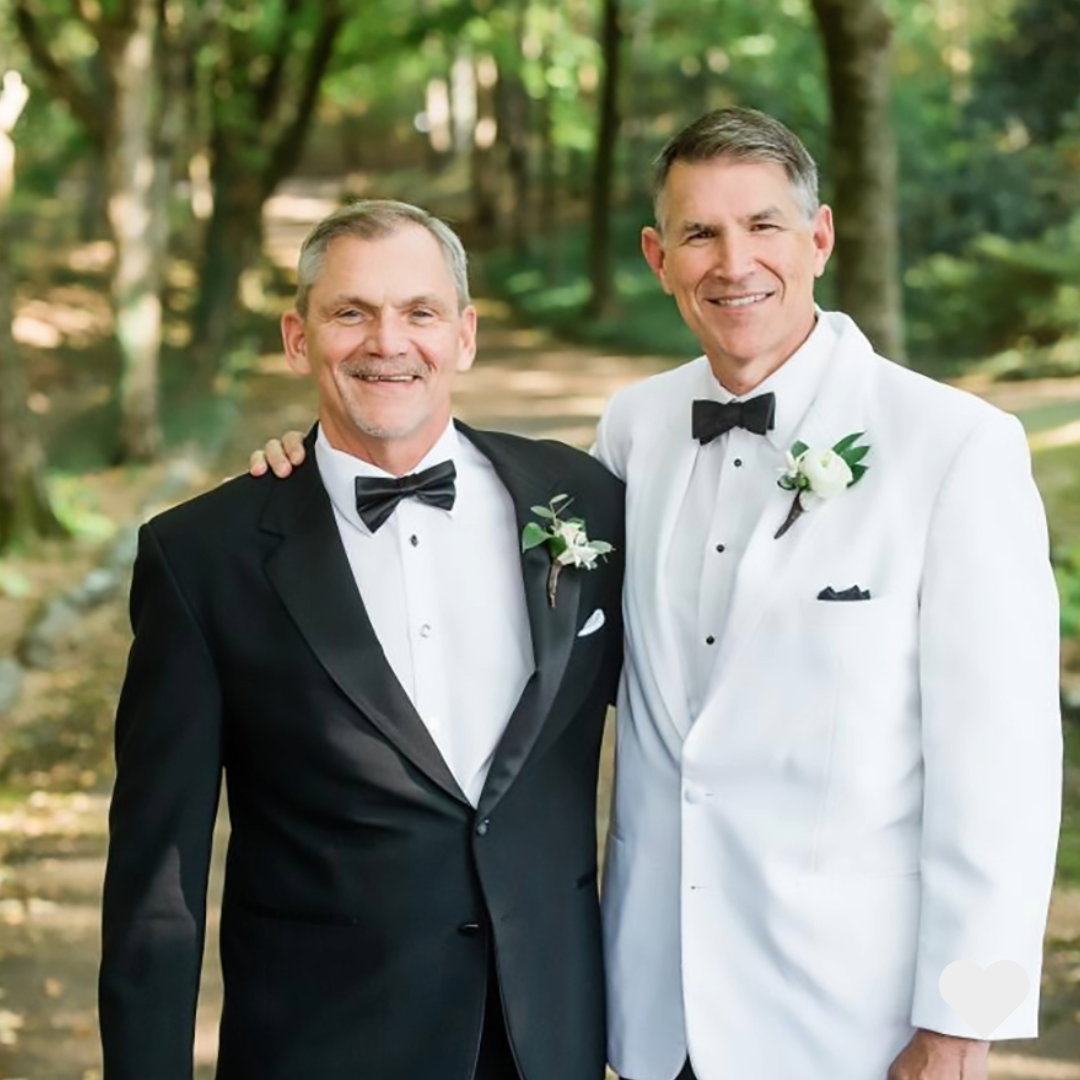 Father of the Bride and Father of the Groom together on their children's wedding day.